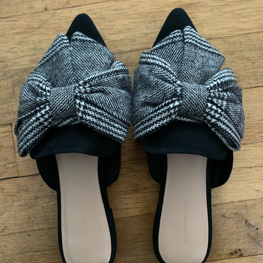 Something Navy black mules with houndstooth bow